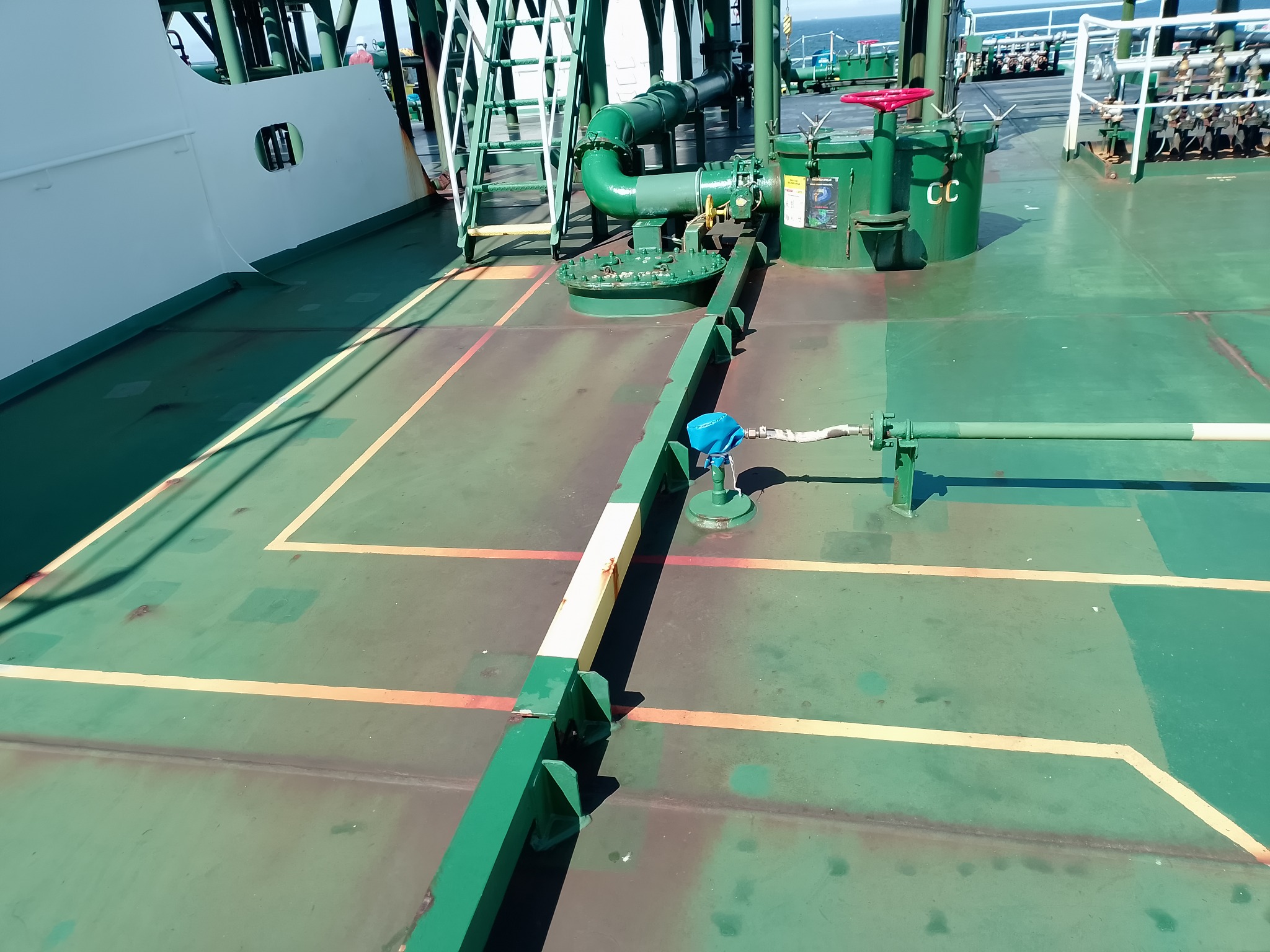 Weather deck showing coating wear around deck structures